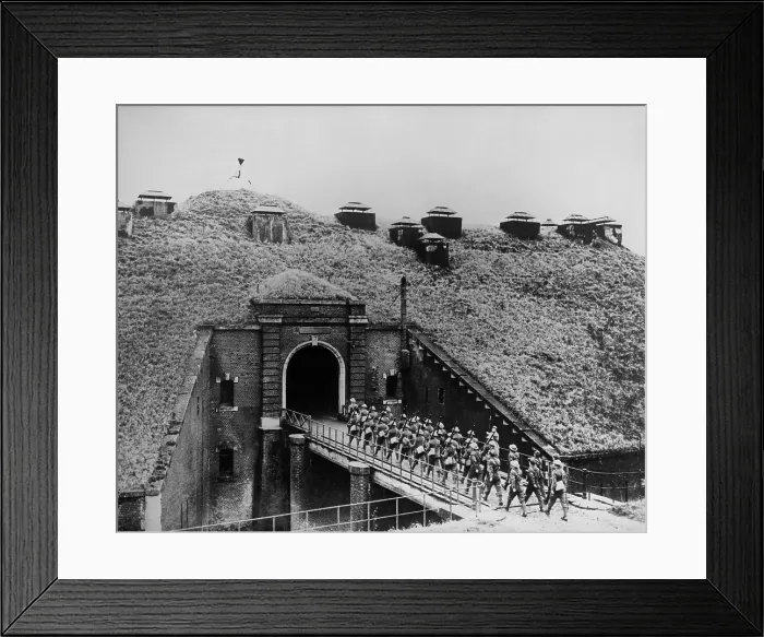 Framed Print : Maginot Line, on the French-German border, Dec. 1939. British troops march over bridge into the French underground fortress covered with vegetation