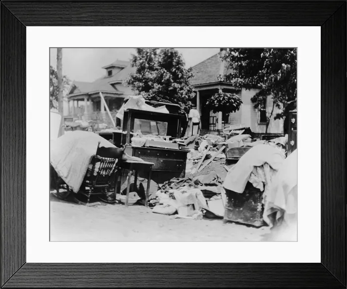 Framed Print : Furniture and belongings in Tulsa street during race riot of May 31 - June 1, 1921. Original caption states the owner was probably evicted during the riot. Photo by Alvin C