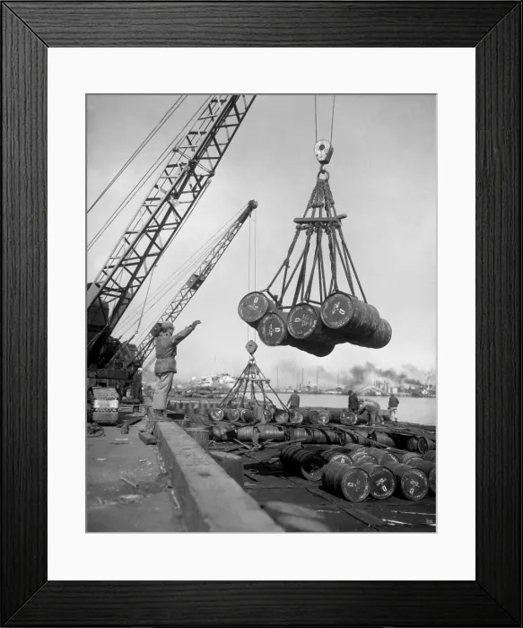 Framed Print : Fuel drums are lifted and moved with cranes from a tanker at Inchon Harbor, Korea. March 7, 1952. Korean War, 1950-53. (BSLOC_2014_11_118) Framed Print : Fuel drums are lifted and moved with cranes from a tanker at Inchon Harbor, Korea. March 7, 1952. Korean War, 1950-53. (BSLOC_2014_11_118)