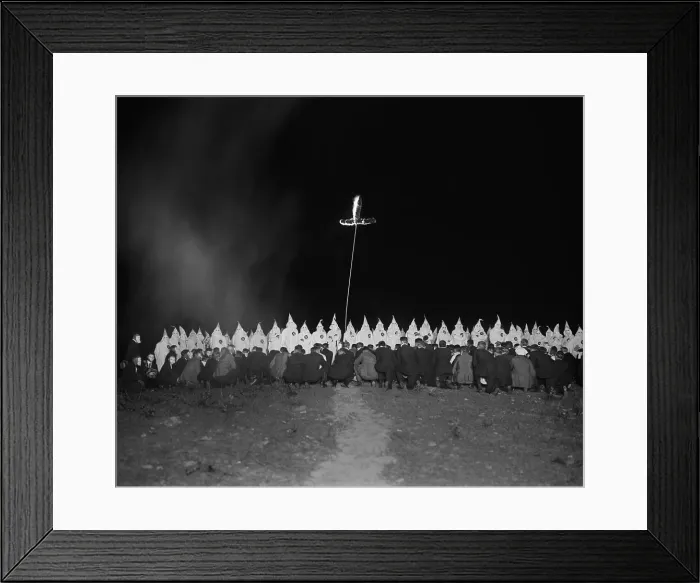 Framed Print : Ku Klux Klan gathering with fully robed and hooded members and kneeling men in face masks Framed Print : Ku Klux Klan gathering with fully robed and hooded members and kneeling men in face masks