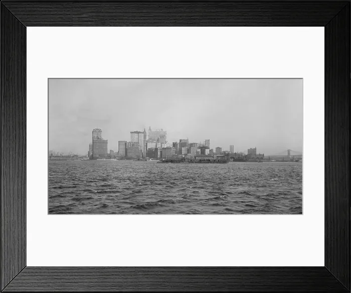 Framed Print : Southern tip of Manhattan Island seen from an approaching boat in the harbor, c. 1920 (BSLOC_2016_10_204)