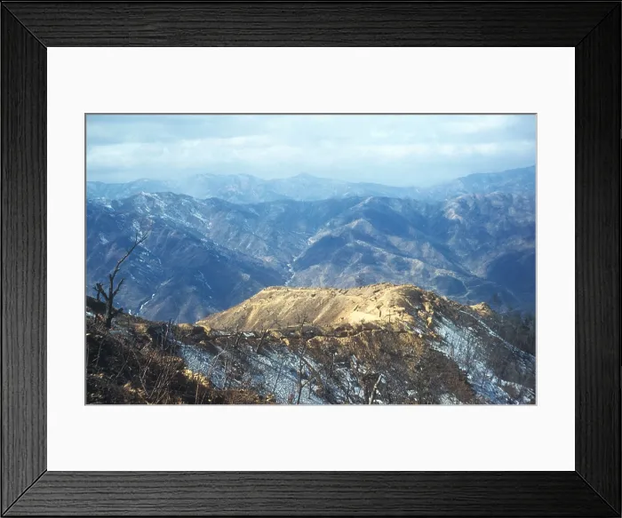 Framed Print : Desolate UN trench line along the mountainous 38th Parallel. Heartbreak Ridge, a fiercely contested position in Sept.-Oct. 1952, is visible in the background Framed Print : Desolate UN trench line along the mountainous 38th Parallel. Heartbreak Ridge, a fiercely contested position in Sept.-Oct. 1952, is visible in the background