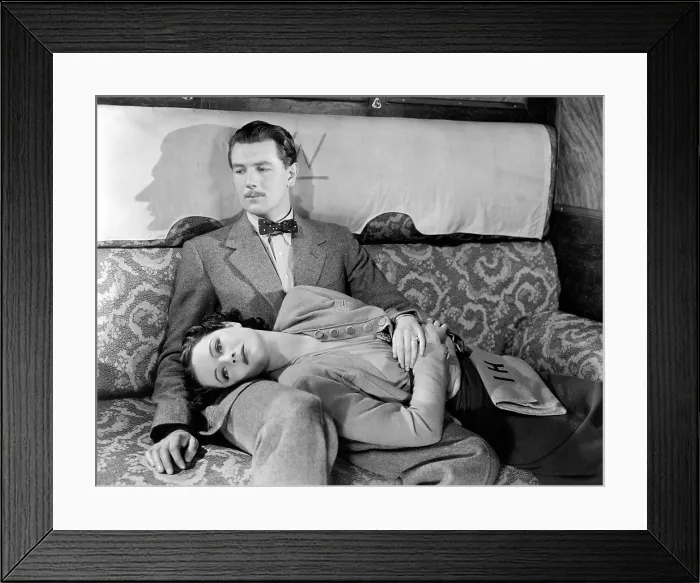 Framed Print : THE LADY VANISHES, Michael Redgrave, Margaret Lockwood (lying down), 1938 Framed Print : THE LADY VANISHES, Michael Redgrave, Margaret Lockwood (lying down), 1938