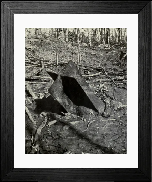 Framed Print : World War 1. With its tail-fins showing, an unexploded air torpedo is half buried in the ground