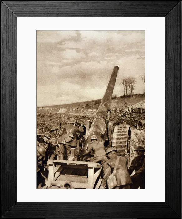 Framed Print : World War 1. A group of soldiers operate modern artillery used by the British on the Somme. The gun had just been loaded and is receiving a final adjustment of aim. Ca. 1916-18 Framed Print : World War 1. A group of soldiers operate modern artillery used by the British on the Somme. The gun had just been loaded and is receiving a final adjustment of aim. Ca. 1916-18