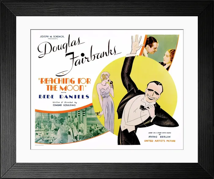 Framed Print : REACHING FOR TEH MOON, top l-r: Douglas Fairbanks, Bebe Daniels on poster art, 1930