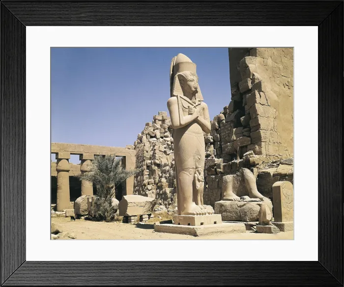 Framed Print : Great Temple of Amon-Re. 16th-4th c. BC. EGYPT. QUENA. Karnak. Thebes. Temple of Amon - Ra. Yard that leads to the second pylon with the colossal statue of Ramesses II