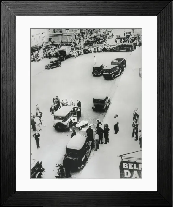 Framed Print : Bullet-riddled taxi and two dead gangsters in a NYC street after a gun battle with police, 1931 (BSLOC_2016_10_75)