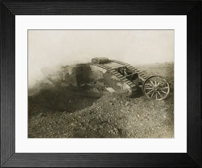 Framed Print : World War 1. Somme Offensive. One of the larger British tanks, the Mark I, spanning an enemy trench. The tank was introduced by the British on Sept