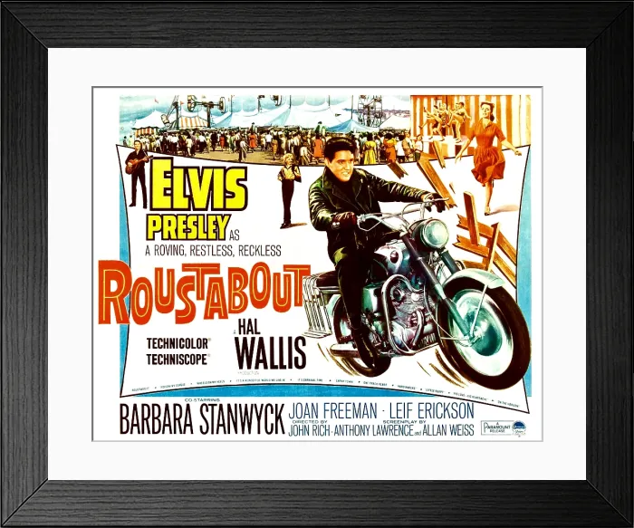 Framed Print : ROUSTABOUT, Elvis Presley (on motorcycle); Barbara Stanwyck (background center, yellow shirt); Joan Freeman (woman upper right, red dress), 1964