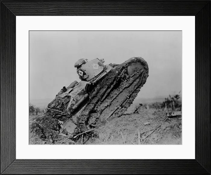 Framed Print : World War 1 Tanks. French Renault FT tanks up-ended and stuck in a battlefield trench or shell crater