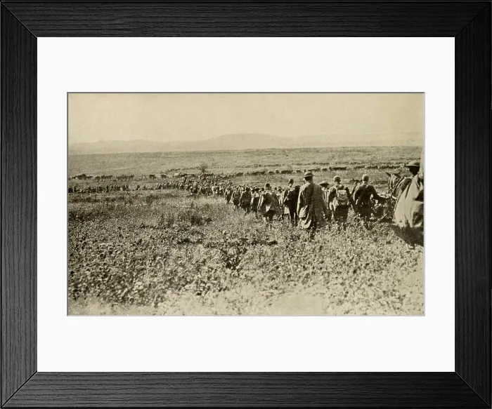 Framed Print : World War 1: Battle of St. Mihiel. In fields near Montsec, France, an American machine gun company passes through a regiment of doughboys. A supply train is in the background Framed Print : World War 1: Battle of St. Mihiel. In fields near Montsec, France, an American machine gun company passes through a regiment of doughboys. A supply train is in the background