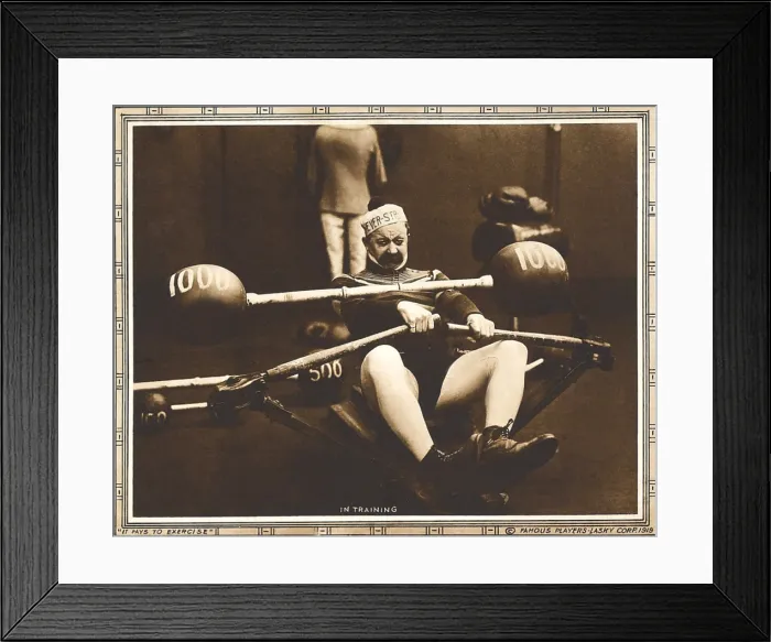 Framed Print : IT PAYS TO EXERCISE, Chester Conklin on lobbycard, 1918