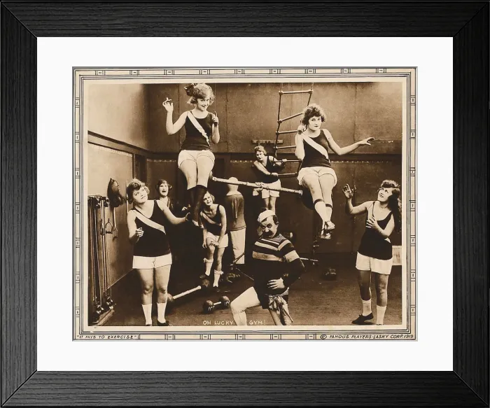 Framed Print : IT PAYS TO EXERCISE, bottom center: Chester Conklin on lobbycard, 1918