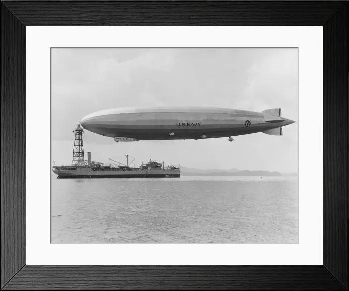 Framed Print : USS Los Angeles at the mooring mast of the USS Patoka, 125 feet above the water. The ship was in the Pacific Ocean off Panama during fleet exercises in Feb