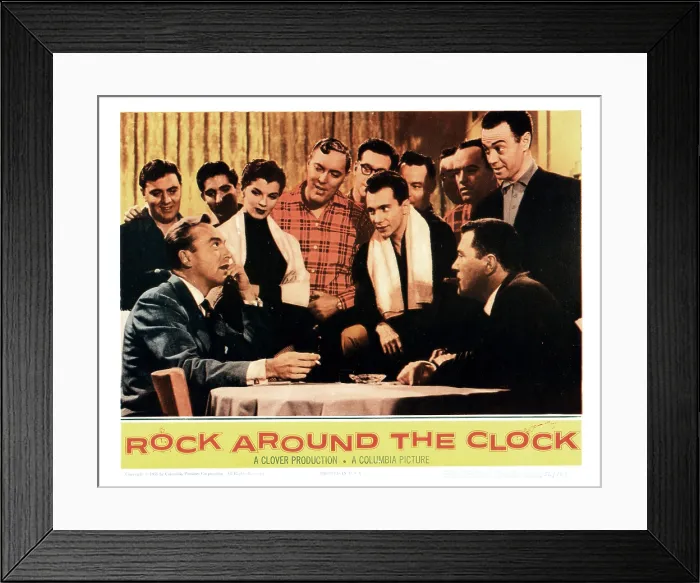 Framed Print : ROCK AROUND THE CLOCK, (seated): Johnnie Johnston (l), John Archer (r), (Standing): Lisa Archer, Bill Haley (plaid shirt), The Comets, Freddie Bell (white scarf), Alan Freed, 1956