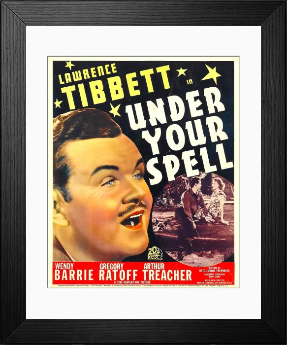 Framed Print : UNDER YOUR SPELL, left: Lawrence Tibbett, inset from left: Lawrence Tibbett, Wendy Barrie on window card, 1936, TM and Copyright 20th Century Fox Film Corp