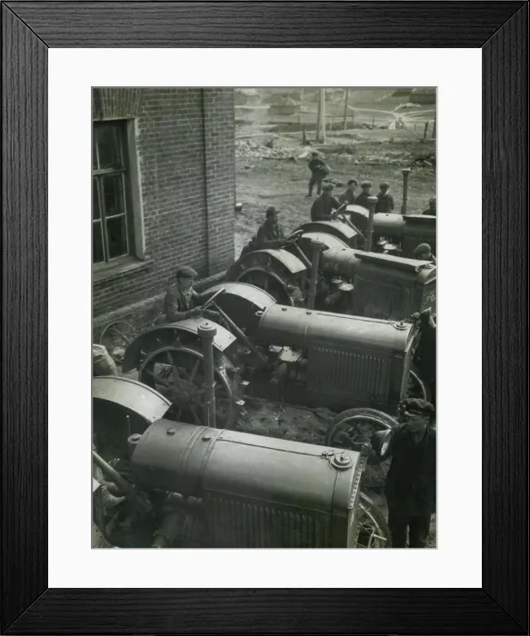 Framed Print : Workers on American made McCormick Deering tractors at a Soviet Russian state dairy farm. Near Rostov-on-Don, USSR, 1922-23 (BSLOC_2017_2_34) Framed Print : Workers on American made McCormick Deering tractors at a Soviet Russian state dairy farm. Near Rostov-on-Don, USSR, 1922-23 (BSLOC_2017_2_34)