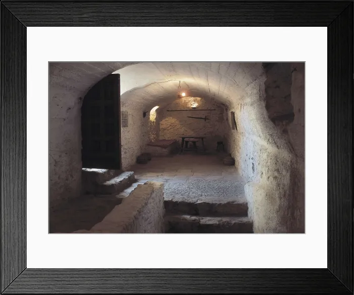 Framed Print : CERVANTES SAAVEDRA, Miguel de (1547-1616). Inside of Medrano's cave, place where Cervantes was imprisoned and where he started to write Don Quixote. SPAIN. CASTILE-LA MANCHA Framed Print : CERVANTES SAAVEDRA, Miguel de (1547-1616). Inside of Medrano's cave, place where Cervantes was imprisoned and where he started to write Don Quixote. SPAIN. CASTILE-LA MANCHA