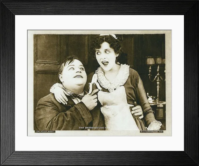 Framed Print : THE ROUGH HOUSE, from left: Roscoe Fatty Arbuckle, Alice Lake in a scene card dated 1919, 1917