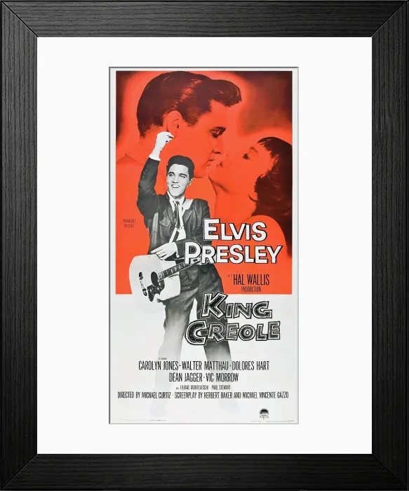 Framed Print : KING CREOLE, rear l-r: Elvis Presley, Carolyn Jones, foreground: Elvis Presley on poster art, 1958