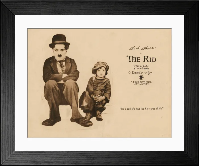 Framed Print : THE KID, lobbycard, from left: Charles Chaplin, Jackie Coogan, 1921 Framed Print : THE KID, lobbycard, from left: Charles Chaplin, Jackie Coogan, 1921
