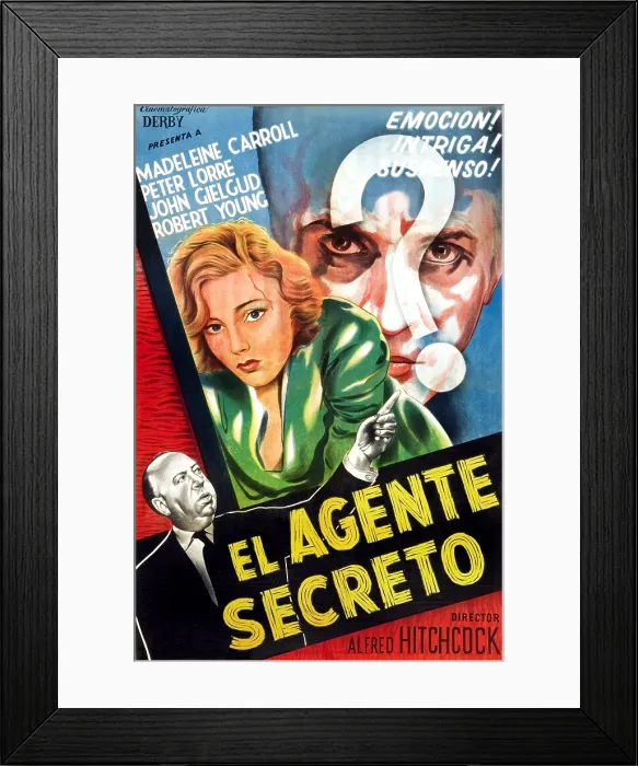 Framed Print : SECRET AGENT, lower left to upper right: Alfred Hitchcock, Madeleine Carroll, John Gielgud on Argentinian poster art, 1936 Framed Print : SECRET AGENT, lower left to upper right: Alfred Hitchcock, Madeleine Carroll, John Gielgud on Argentinian poster art, 1936