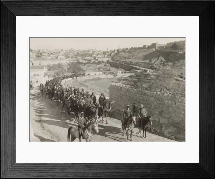 Framed Print : World War 1 in the Middle East. Volunteer Arab Camel Corps from South Arabia fighting with Turkish forces leaving Jerusalem for the battle front in Palestine. 1916