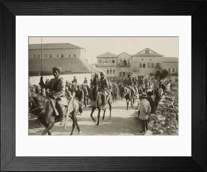 Framed Print : World War 1 in the Middle East. British Empire Indian Lancers guard marching Turkish prisoners in Palestine. 1918. (BSLOC_2013_1_75)