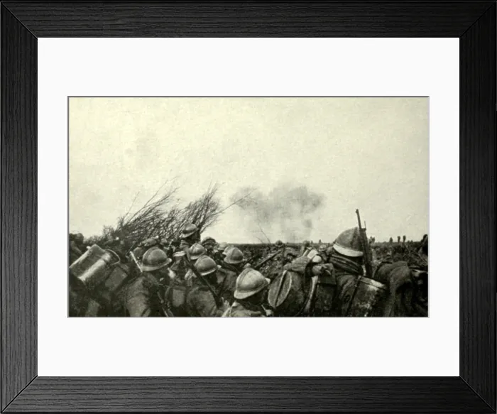 Framed Print : World War 1: Battle of Verdun. In the first days of the battle, the French infantry watch the retreating Germans rear guard in the distance