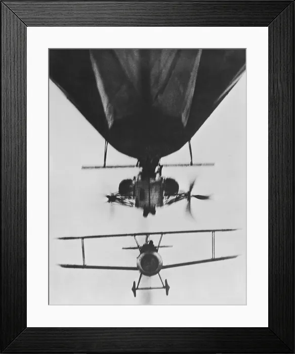Framed Print : British aeroplane dropping off, after release from a dirigible, during WW1, 1914-18. (BSLOC_2016_13_178.jpg )