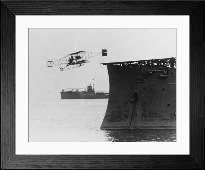 Framed Print : Eugene B. Ely flies his Curtiss pusher airplane from USS Birmingham, Nov. 14, 1910. It was the first airplane to takeoff from a warship