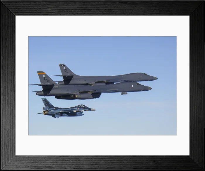 Framed Print : Two US Air Force B-1B Lancers fly with a Japanese air force F-15 fighter jet Framed Print : Two US Air Force B-1B Lancers fly with a Japanese air force F-15 fighter jet
