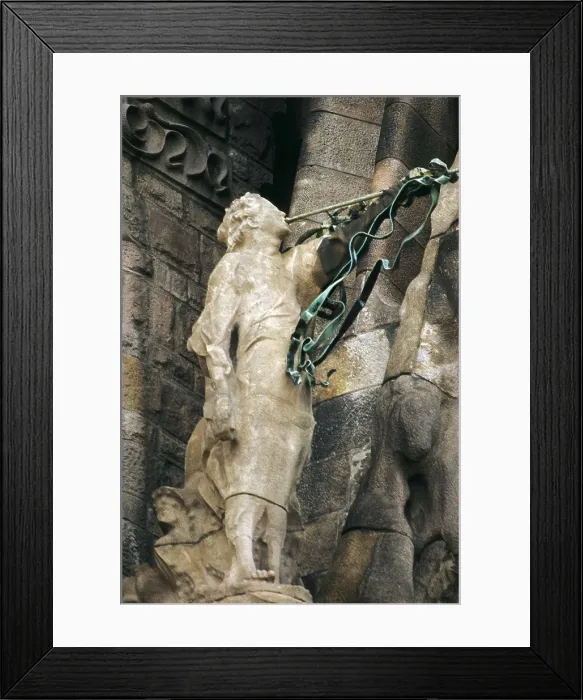 Framed Print : GAUDI i CORNET, Antoni (1852-1926). Sagrada Familia (Expiatory Temple of the Holy Family). 1884-1926. SPAIN. Barcelona. Expiatory Church of the Holy Family. Trumpeter angel