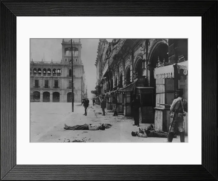 Framed Print : Soldier on alert among dead bodies in Mexico City, Feb. 1913. Probably during the Ten Tragic Days of the overthrow and murder of President Madero (BSLOC_2016_13_37.jpg )