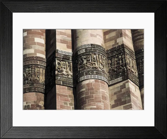 Framed Print : Quwwat Al-Islam Mosque. 1190s. INDIA. DELHI. Delhi. Detail of the minaret Qutub Minar of the Quwwat Al-Islam Mosque. Islamic art. Architecture