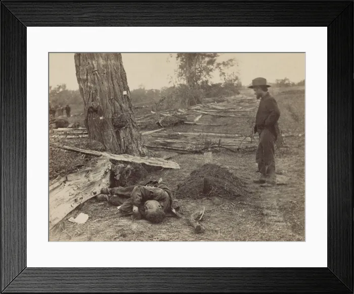 Framed Print : US Civil War. Battle of Antietam, also called Battle of Sharpsburg, Sept. 17, 1862. A man stands at the grave of 1st Lt. John A. Clark, Company D, of the 7th Michigan Infantry