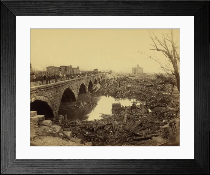 Framed Print : Debris at Pennsylvania Railroad stone bridge, after the Johnstown Flood of May 31, 1889. This was the most horrific site of the disaster