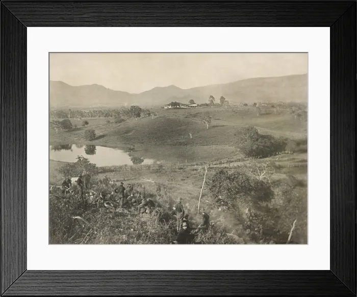 Framed Print : Soldiers below the field on which the Battle of San Juan Hill was fought on July 1, 1898. A column of solders walks on the road below