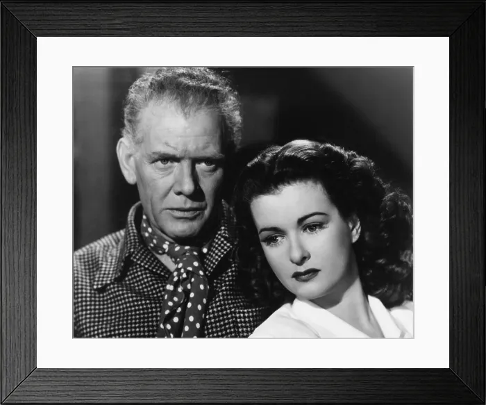 Framed Print : THE WOMAN ON THE BEACH, from left: Charles Bickford, Joan Bennett, 1947