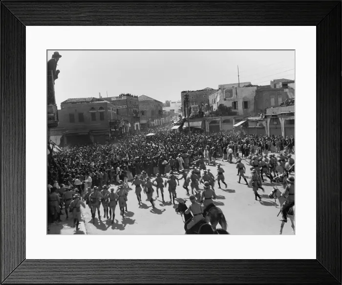 Framed Print : Arab protestors with clubs charged by British police in Jaffa, Palestine, Oct. 29, 1933. In Jaffa Square, mounted officers follow Framed Print : Arab protestors with clubs charged by British police in Jaffa, Palestine, Oct. 29, 1933. In Jaffa Square, mounted officers follow
