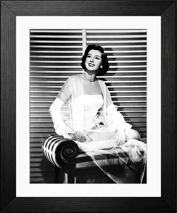 Framed Print : A WOMAN OF DISTINCTION, Rosalind Russell (in a gown by Jean Louis), 1950