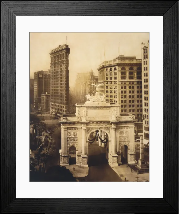 Framed Print : World War I Victory Arch, on Fifth Avenue near Madison Sqaure Park in 1919. In the near distance is the Flatiron Building, built in 1902 by architect Daniel Burnham