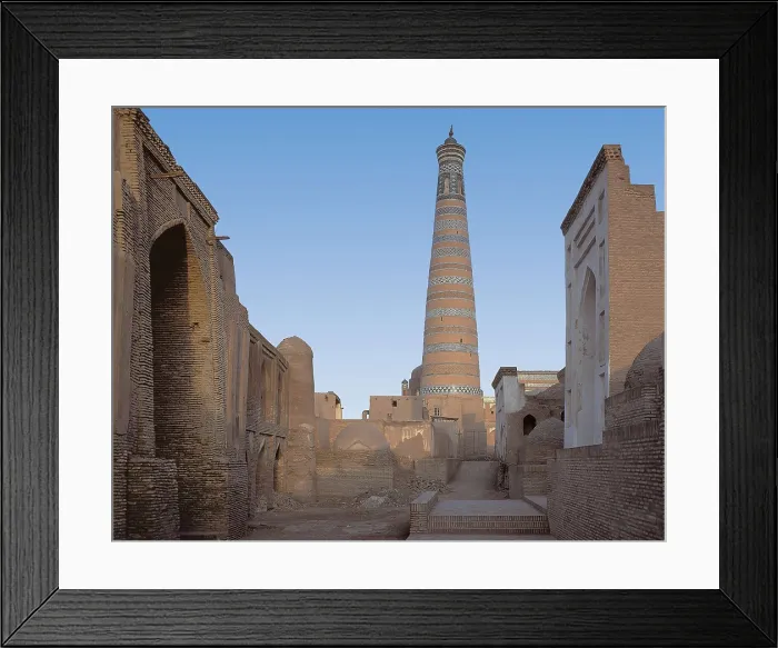 Framed Print : UZBEKISTAN. HOREZM. Khiwa. Pahlavan Mahmud Complex or Mausoleum of Khans (1701). Highlightning the Islam Jodzha minaret. AISA / Everett Collection**US SALES ONLY**