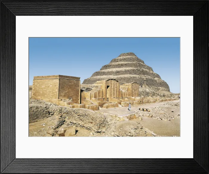 Framed Print : IMHOTEP (ca. 2667 BC-2648 BC). The step pyramid of Djoser. 2668 -2649 BC. EGYPT. CAIRO. Saqqara. Pyramid of Djoser. Djoser's step pyramid and funerary complex. Egyptian art