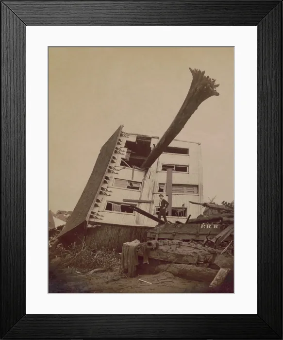 Framed Print : A house wrecked in the Johnstown Flood of May 31, 1889. The building lies on its side in a pile of rubble with a tree trunk extending through a window Framed Print : A house wrecked in the Johnstown Flood of May 31, 1889. The building lies on its side in a pile of rubble with a tree trunk extending through a window