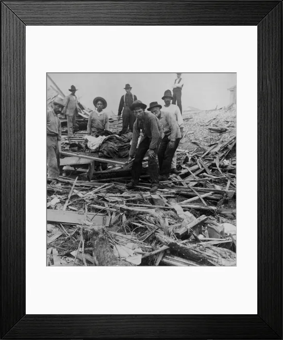 Framed Print : Men carrying bodies on stretcher, surrounded by wreckage of the hurricane in Galveston, Texas, Sept. 1900. The disaster occurred on Sept Framed Print : Men carrying bodies on stretcher, surrounded by wreckage of the hurricane in Galveston, Texas, Sept. 1900. The disaster occurred on Sept