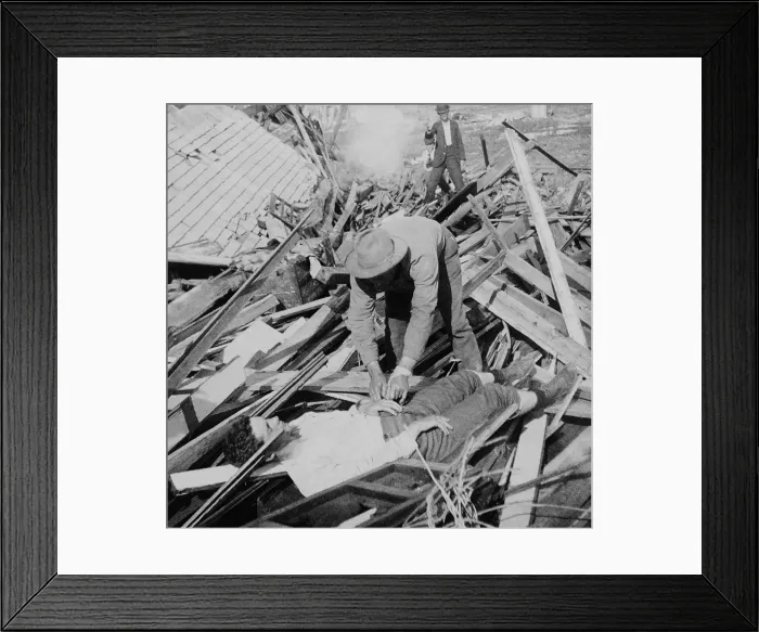 Framed Print : Photo shows a man who has discharged a pistol aimed at a looter in Galveston, Texas, Sept. 1900 Framed Print : Photo shows a man who has discharged a pistol aimed at a looter in Galveston, Texas, Sept. 1900