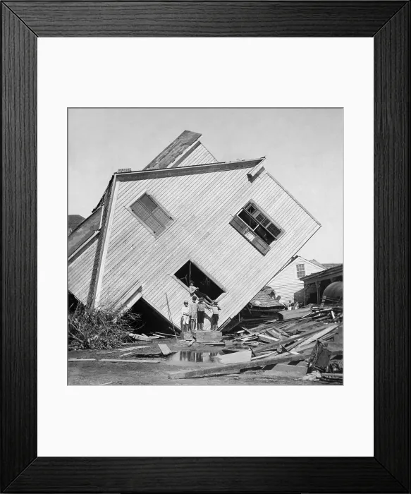 Framed Print : A house tipped on side after the 15 foot storm surge of the Galveston Hurricane of Sept. 1900. Five boys pose in front of the house on Avenue N (BSLOC_2017_17_88) Framed Print : A house tipped on side after the 15 foot storm surge of the Galveston Hurricane of Sept. 1900. Five boys pose in front of the house on Avenue N (BSLOC_2017_17_88)