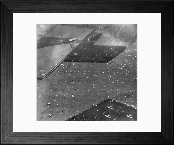 Framed Print : Allied planes drop paratroopers onto Holland's fields already dotted with gliders and airborne troops. Sept. 17, 1944 Framed Print : Allied planes drop paratroopers onto Holland's fields already dotted with gliders and airborne troops. Sept. 17, 1944
